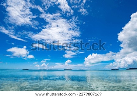 Calm blue ocean and tropical islands in Ngerechong Island, Rock Island Southern Lagoon, Palau