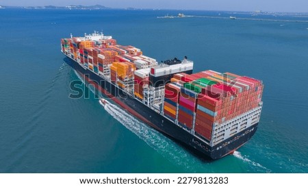 Stern of cargo ship carrying container and running for import goods from cargo yard port to custom ocean concept technology transportation , customs clearance. Freight Forwarding Service