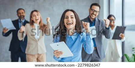 Excited happy multiracial businesspeople have fun engaged in activity in office together, overjoyed diverse colleagues dance celebrate successful business project, Friday celebration concept Royalty-Free Stock Photo #2279826347