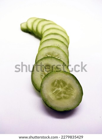 Cucumber slices isolated in white background