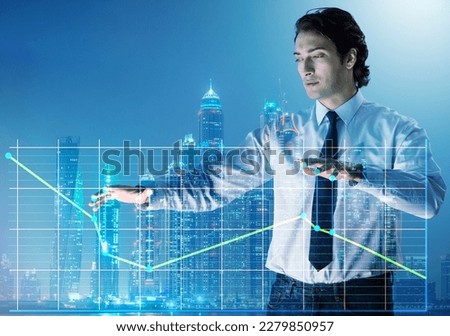 Businessman controlling the market with strings Royalty-Free Stock Photo #2279850957