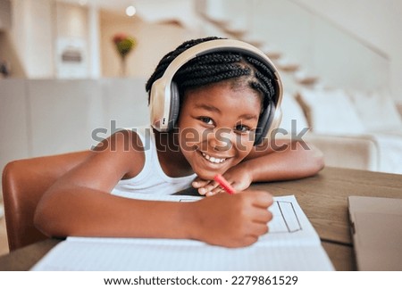 Education, elearning and headphones of african child listening to audio translation, language learning and writing notes in book. Black girl kid at home with e learning, online education and portrait Royalty-Free Stock Photo #2279861529