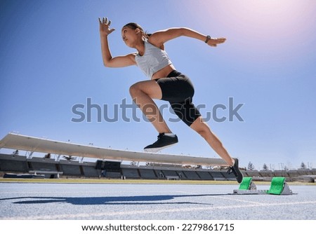 Woman runner, running and training on track, workout and exercise for race, marathon and sport in stadium. Speed, sports and fitness athlete with cardio, sprinter and run fast for competition Royalty-Free Stock Photo #2279861715