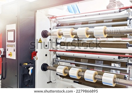 Slitter rewinder machine industrial technology Royalty-Free Stock Photo #2279866895