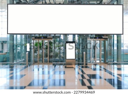 Blank advertising banner, billboard mockup in generic modern interior retail environment. Large digital display screen, an out-of-home OOH media display space Royalty-Free Stock Photo #2279934469
