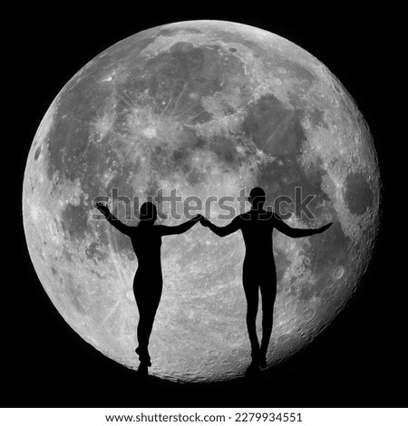 man and a woman against the backdrop of the full moon. Love story.