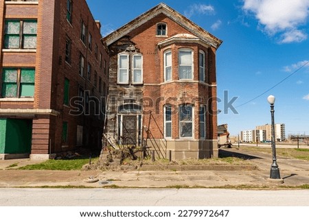 Old abandoned derelict house with missing bricks.  Cairo, Illinois, USA. Royalty-Free Stock Photo #2279972647