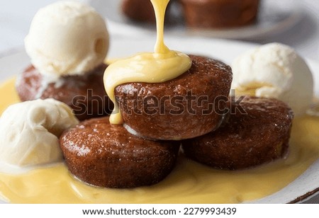 Malva Pudding. A highly regarded dish in Africa, Malva tends to be served hot with jam or custard in the Sourthen regions Royalty-Free Stock Photo #2279993439