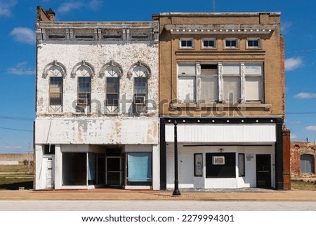 Abandoned building and storefront in downtown Cairo, Illinois, USA. Royalty-Free Stock Photo #2279994301