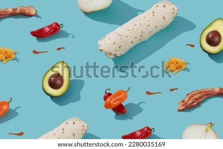 Assortment of ingredients to make a Breakfast Burrito, isometric three quarter view Royalty-Free Stock Photo #2280035169