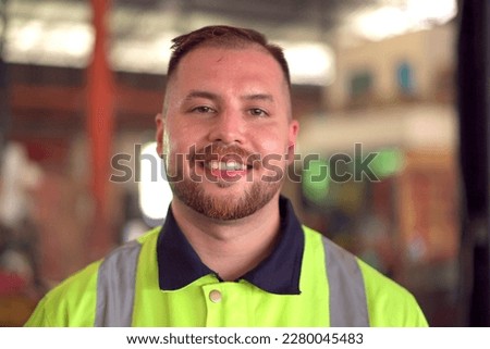 Happy caucasian white male factory worker or engineer portrait, a senior professional engineer or foreman portrait in factory. Royalty-Free Stock Photo #2280045483
