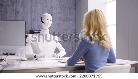 Men At Interview With AI Robot Machine Royalty-Free Stock Photo #2280071965