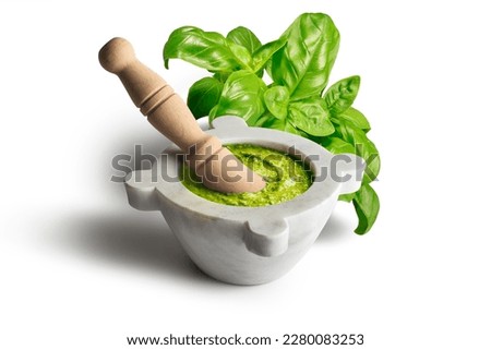 Genoese pesto sauce with mortar and ingredients isolated on white background Royalty-Free Stock Photo #2280083253