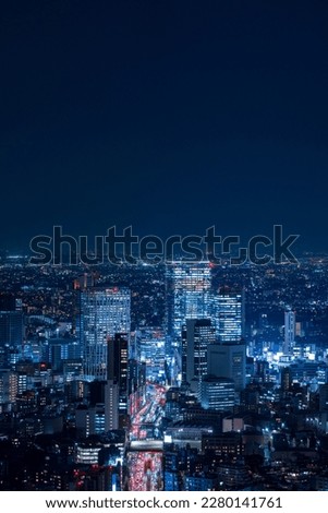Tokyo Shibuya area panoramic view with car light trails at night. Royalty-Free Stock Photo #2280141761