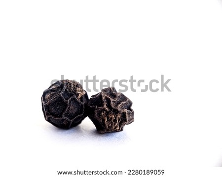 closeup picture of seeds of black pepper