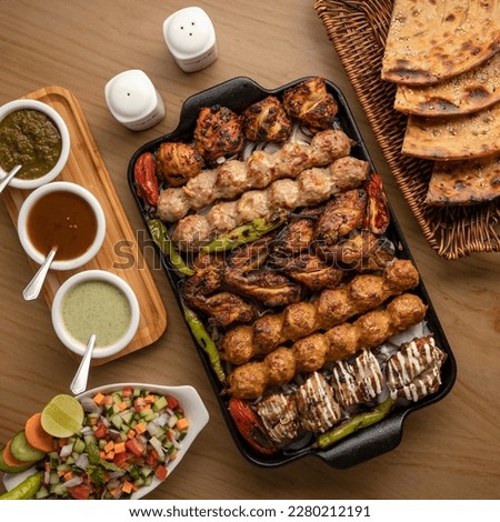 Indian Pakistani Food Collection, individually presented cuisines. Royalty-Free Stock Photo #2280212191
