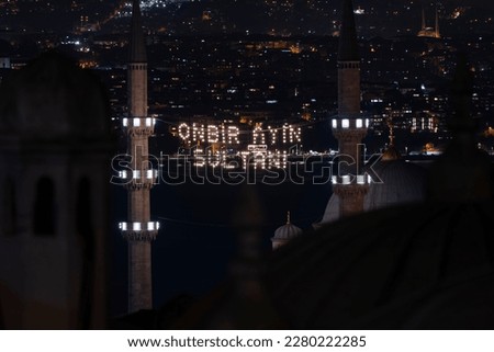 Ramadan Month New Mosque (Yeni Cami), Illuminated Letters Between Minarets (Mahya) Drone Photo, Suleymaniye Fatih, Istanbul Turkey