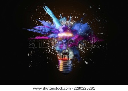 Creative colored light bulb explosion with shards and paint, a creative idea. Think different, concept. Business, ideas and the discovery of new technology Royalty-Free Stock Photo #2280225281