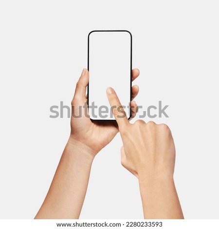 Hand holding a smartphone, and another hand pointing	
 Royalty-Free Stock Photo #2280233593