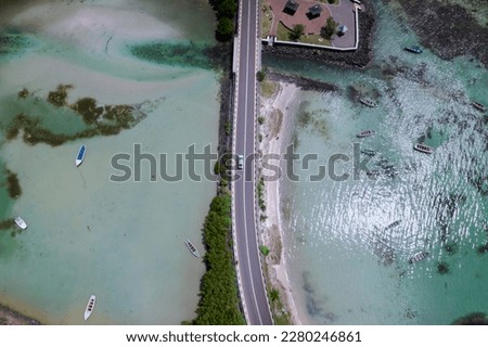A breath taking composition in the island of Mauritius. Ideal for your Resorts and business canva in your lobby. As the car crossed the bridge, i was baffled by that click from my DJI AIR 2s.