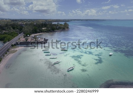 Boats who have sailed the east-coast of Mauritius under the sun or hurricane.The aerial drone shot ideal for your posters, canva,wall artwork and more! It will look great in your Resort, Restaurants.