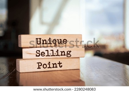Wooden blocks with words 'Unique Selling Point'. USP Royalty-Free Stock Photo #2280248083