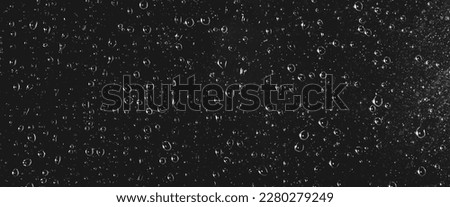 Atmospheric minimal grayscale backdrop with rain droplets on glass. Wet window with rainy drops and dirt spots closeup. Blurry minimalist monochrome background of dirty window glass with raindrops. Royalty-Free Stock Photo #2280279249