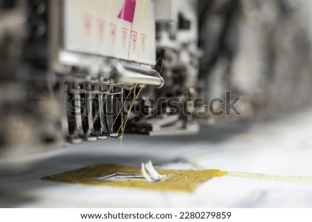  industrial embroidery machines macro photography