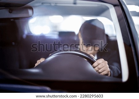 Tired and sleepy driver. Drowsy man driving car. Person sleeping in traffic. Accident or crash. Drunk person, alcohol law violation, DUI. Dangerous irresponsible travel at night. Exhausted fatigue guy Royalty-Free Stock Photo #2280295603