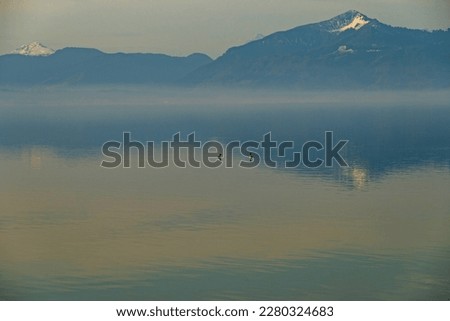 view over the Chiemsee lake to the alps