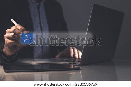 Businessman use laptop for searching online. Search engine bar. Browsing Internet concept.