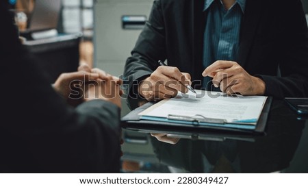Businessman negotiation and signing contract document on business partner meeting. Successful partnership with entrepreneur or company making a deal.