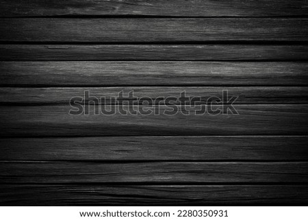 black wood texture. table surface of dark planks background