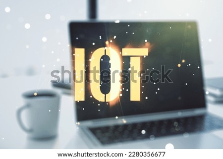 Double exposure of creative IOT hologram on laptop background, research and development concept