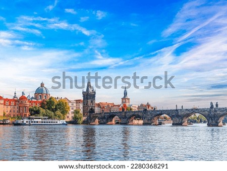 Prague - Charles bridge, Czech Republic. Scenic aerial sunset on the architecture of the Old Town Pier and Charles Bridge over the Vltava River in Prague, Czech Republic. Royalty-Free Stock Photo #2280368291