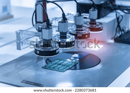 automatic robot vision sensor camera system in intellegence pcb factory Royalty-Free Stock Photo #2280373681
