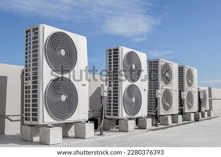 Air conditioning (HVAC) installed on the roof of industrial buildings. Royalty-Free Stock Photo #2280376393