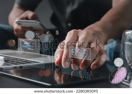 Cost and quality management, corporate strategy, and the idea of project management. A businessperson using a digital tablet to conduct productive business while monitoring quality control growth Royalty-Free Stock Photo #2280385095