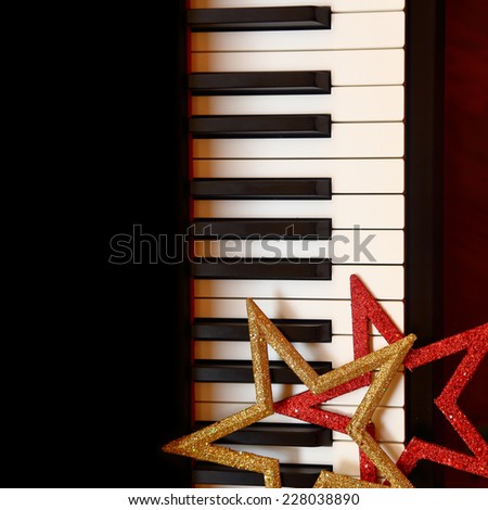 Christmas ornaments on piano keys