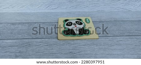 simple little panda puzzle. great toy for children's education.