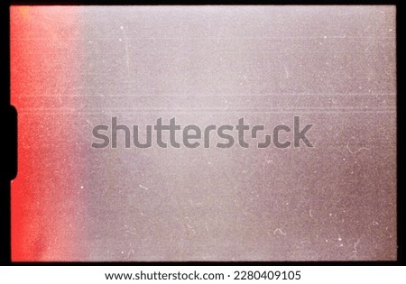 scan of empty super 8mm film frame with dust and scratches, cool film border mockup overlay. Royalty-Free Stock Photo #2280409105