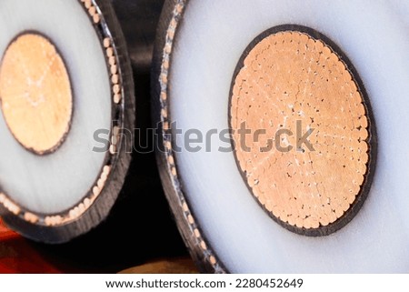Close-up of high voltage copper cable cross-section, Industrial concept background Royalty-Free Stock Photo #2280452649