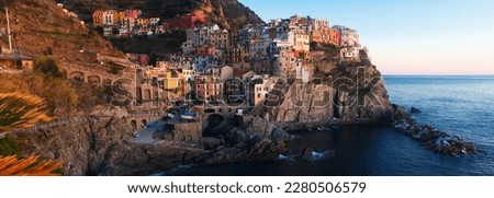 Small picturesque Italian town of Manarola in evening time Royalty-Free Stock Photo #2280506579