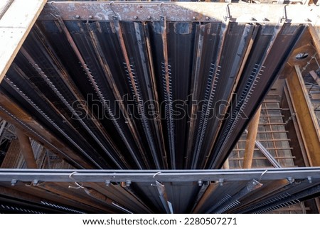 View of collection or discharge electrodes and collector plates of electrostatic precipitator (ESP) filter. Royalty-Free Stock Photo #2280507271