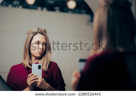 
Narcissistic Woman Feeling Important While Taking Mirror Selfies. Funny conceited queen feeling superior, proud and self-important
 Royalty-Free Stock Photo #2280526441