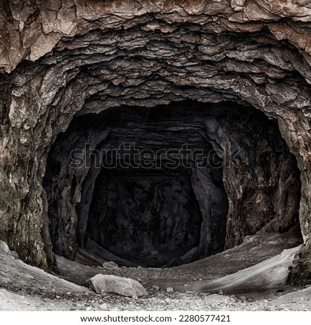 The entrance to the old abandoned limestone adits. Royalty-Free Stock Photo #2280577421