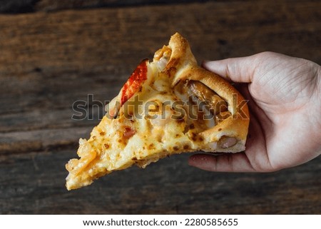  seafood pizza on wooden table background