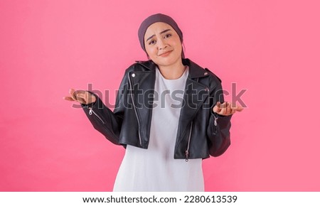 assorted female expressions on pink background