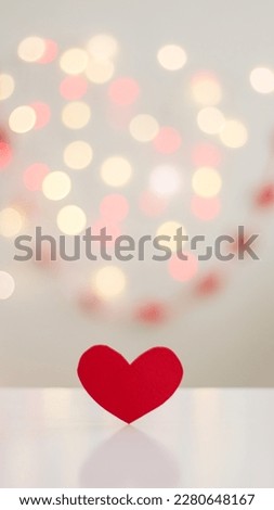 Red heart with bokeh in background. blurred background.  