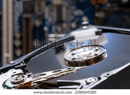 An open computer hard drive in close-up.